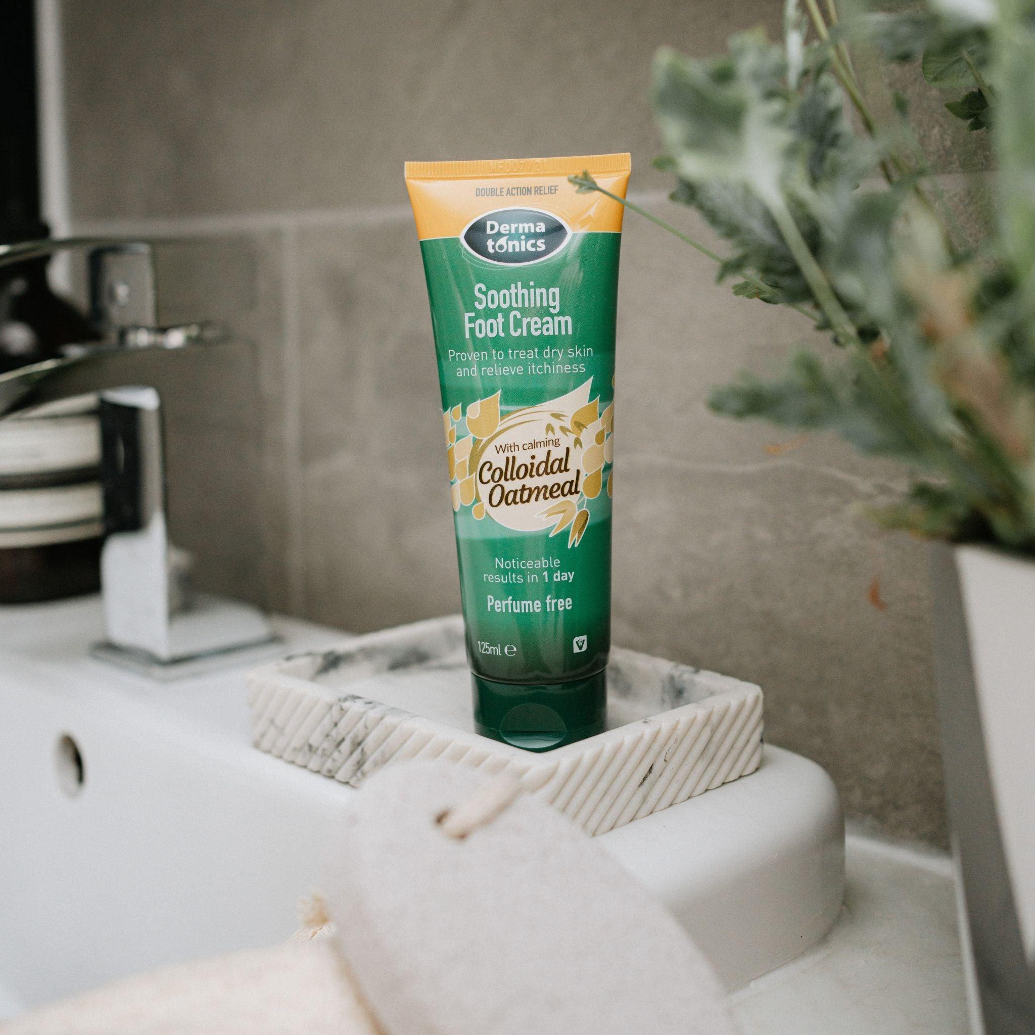 Lifestyle image of Dermatonics Soothing Foot Cream in bathroom.